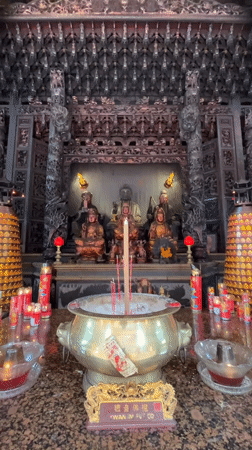 Temple visit documented in Denpasar, Indonesia