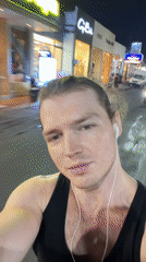 Man records himself jogging on lit street in Kuta
