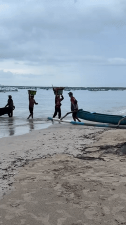 Evening beach life documented in Kuta, Indonesia