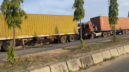 Morning street activity recorded in commercial Abuja district
