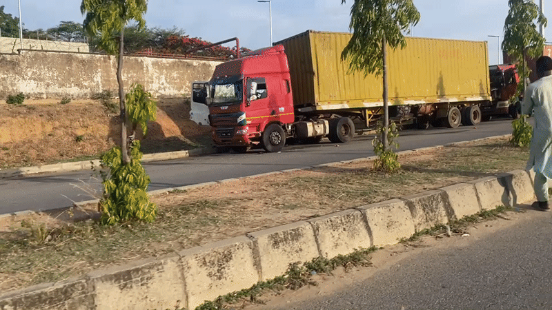 Morning street activity recorded in commercial Abuja district