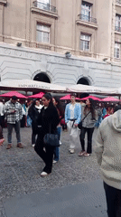 Evening street life and cultural activities observed in Santiago