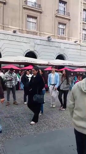 Evening street life and cultural activities observed in Santiago