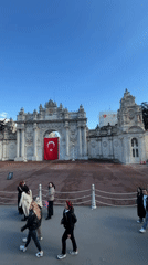Dolmabahçe Palace gate captured on sunny afternoon in Istanbul
