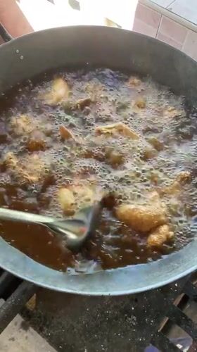 Fried chicken preparation documented in Kiblawan, Philippines