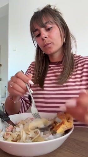 Woman dines at restaurant in Cannes, France