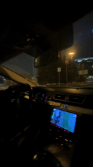 Passenger records nighttime drive through Yekaterinburg streets