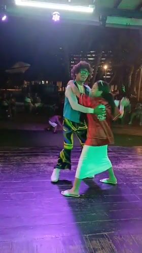 Retro-themed costume party celebration captured in Porlamar, Venezuela