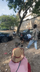 Outdoor barbering session filmed in Ikoyi, Nigeria