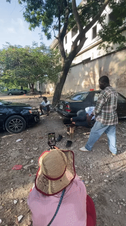 Outdoor barbering session filmed in Ikoyi, Nigeria