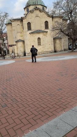 Historic plaza with green-domed building documented in Varna, Bulgaria