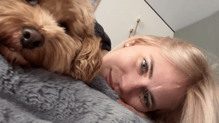 Woman and dog share quiet morning moment in Saratov
