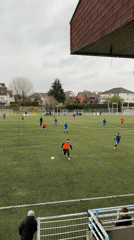 Youth soccer match documented on artificial turf in Bischheim
