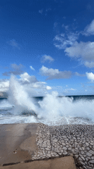 Waves crash against seawall in coastal Montenegro