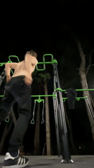 Man exercises at nighttime playground in Bar, Montenegro