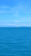 Ferry passengers document peaceful morning journey near Ko Samui