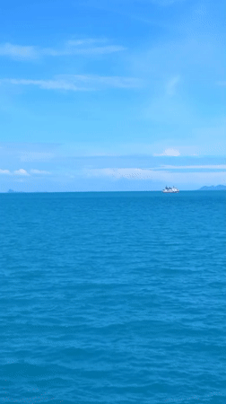 Ferry passengers document peaceful morning journey near Ko Samui