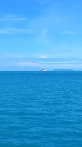 Ferry passengers document peaceful morning journey near Ko Samui
