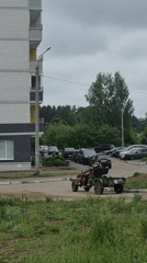 Farm Tractor Travels Down Residential Street