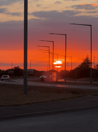 Vivid summer sunset over Great Yarmouth roadside