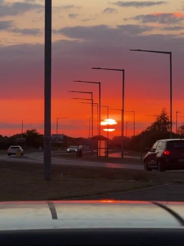 Vivid summer sunset over Great Yarmouth roadside