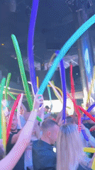 Nightclub balloon performance draws crowd participation in Nesebar, Bulgaria