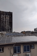 Lagos rooftop views capture diverse urban landscape under cloudy skies