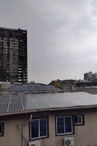 Lagos rooftop views capture diverse urban landscape under cloudy skies