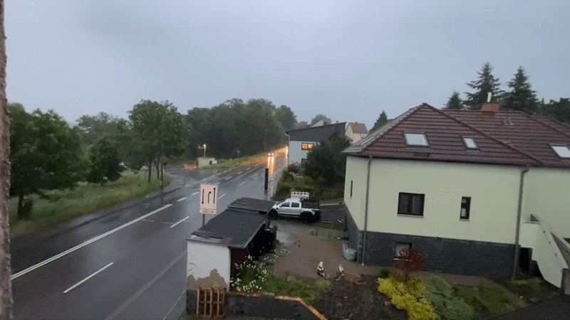Rainy afternoon McDonald's meal observed from indoor residential window