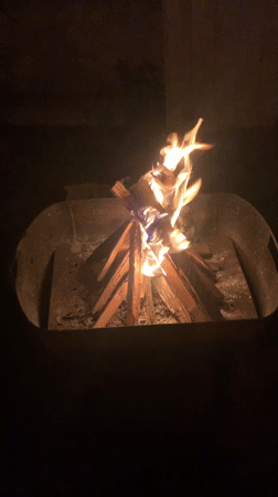 Campfire burning in a metal pit, Tabagrebi, Georgia