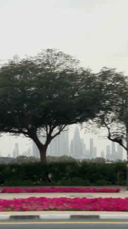Dubai skyline captured on hazy afternoon featuring Burj Khalifa