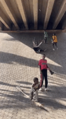 Children play under overpass in Jos, Nigeria