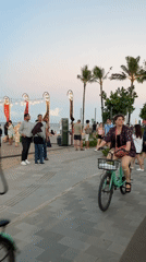 Everyday moments captured along Denpasar's busy seaside promenade