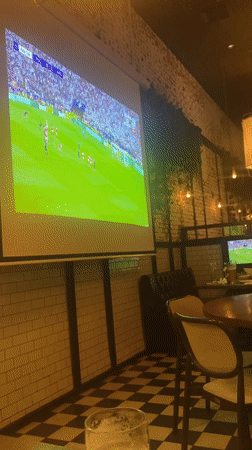 Soccer fans watch game at Kiryat Bialik restaurant