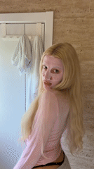 Woman documents facial mask routine in Belgrade bathroom