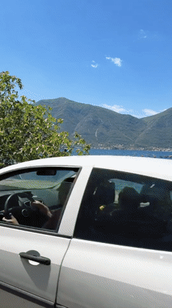 Peaceful bay scene documented in Dobrota, Montenegro
