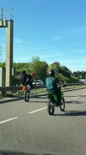 Motorcyclists perform stunts on highway near Longwy, France