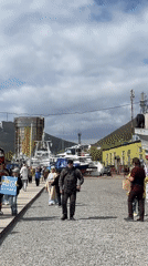 Harbor market with fish grilling, costumed performer in Petropavlovsk-Kamchatsky