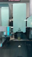 Robotic coffee machine dispenses green drinks in Puebla, Mexico