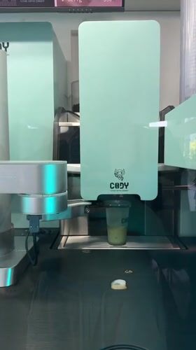 Robotic coffee machine dispenses green drinks in Puebla, Mexico