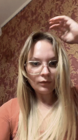 Woman records social media content in Rehovot