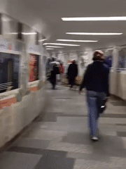 Morning commute through Novosibirsk subway entrance captured