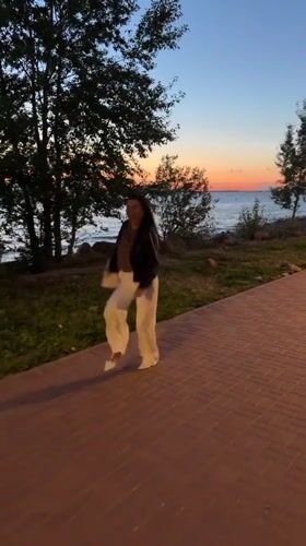 Dancing along a brick pathway in Saint Petersburg