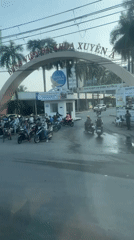 Evening street activity documented near Ho Chi Minh City hospital