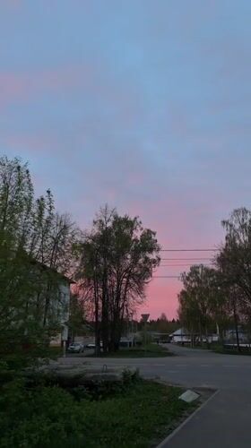Mother documents evening stroll with toddler in Russian suburb