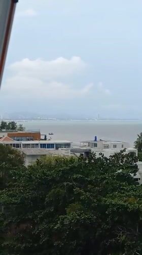 Calm coastal morning observed from elevated Pattaya vantage point