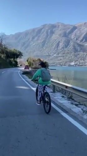 Cyclist spotted riding through Kostanjica Montenegro streets