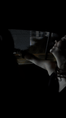 Women sing, wave from moving vehicle at night in Mexico