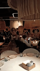 Moscow restaurant captured during evening dinner service May 4