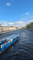 Ordinary afternoon unfolds across Saint Petersburg's canals and squares